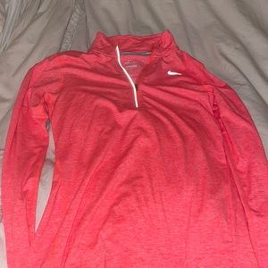Nike dri fit 1/2 quarter zip pull over. Size small coral/ salmon